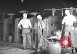 Image of industrial workers at ingot-furnace United States USA, 1920, second 10 stock footage video 65675028691