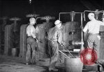 Image of industrial workers at ingot-furnace United States USA, 1920, second 12 stock footage video 65675028691