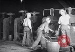 Image of industrial workers at ingot-furnace United States USA, 1920, second 18 stock footage video 65675028691