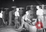 Image of industrial workers at ingot-furnace United States USA, 1920, second 19 stock footage video 65675028691