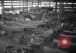 Image of OPM chief Knudsen at Boeing plane factory Seattle Washington USA, 1941, second 25 stock footage video 65675028749