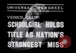 Image of Relna Brewster wrestles male opponent Venice Beach Los Angeles California USA, 1938, second 1 stock footage video 65675028765