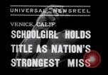 Image of Relna Brewster wrestles male opponent Venice Beach Los Angeles California USA, 1938, second 3 stock footage video 65675028765