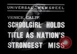 Image of Relna Brewster wrestles male opponent Venice Beach Los Angeles California USA, 1938, second 4 stock footage video 65675028765