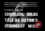 Image of Relna Brewster wrestles male opponent Venice Beach Los Angeles California USA, 1938, second 5 stock footage video 65675028765