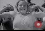 Image of Relna Brewster wrestles male opponent Venice Beach Los Angeles California USA, 1938, second 8 stock footage video 65675028765
