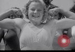 Image of Relna Brewster wrestles male opponent Venice Beach Los Angeles California USA, 1938, second 9 stock footage video 65675028765