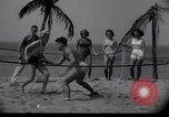 Image of Relna Brewster wrestles male opponent Venice Beach Los Angeles California USA, 1938, second 12 stock footage video 65675028765