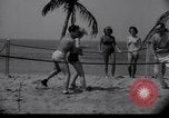 Image of Relna Brewster wrestles male opponent Venice Beach Los Angeles California USA, 1938, second 14 stock footage video 65675028765