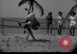 Image of Relna Brewster wrestles male opponent Venice Beach Los Angeles California USA, 1938, second 16 stock footage video 65675028765