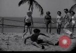 Image of Relna Brewster wrestles male opponent Venice Beach Los Angeles California USA, 1938, second 17 stock footage video 65675028765