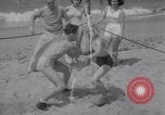 Image of Relna Brewster wrestles male opponent Venice Beach Los Angeles California USA, 1938, second 19 stock footage video 65675028765