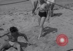 Image of Relna Brewster wrestles male opponent Venice Beach Los Angeles California USA, 1938, second 24 stock footage video 65675028765