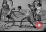 Image of Relna Brewster wrestles male opponent Venice Beach Los Angeles California USA, 1938, second 26 stock footage video 65675028765