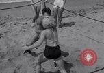 Image of Relna Brewster wrestles male opponent Venice Beach Los Angeles California USA, 1938, second 31 stock footage video 65675028765