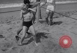 Image of Relna Brewster wrestles male opponent Venice Beach Los Angeles California USA, 1938, second 33 stock footage video 65675028765