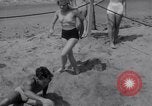 Image of Relna Brewster wrestles male opponent Venice Beach Los Angeles California USA, 1938, second 37 stock footage video 65675028765