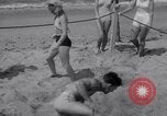 Image of Relna Brewster wrestles male opponent Venice Beach Los Angeles California USA, 1938, second 38 stock footage video 65675028765
