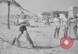 Image of Relna Brewster wrestles male opponent Venice Beach Los Angeles California USA, 1938, second 39 stock footage video 65675028765