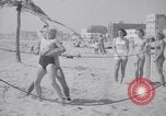Image of Relna Brewster wrestles male opponent Venice Beach Los Angeles California USA, 1938, second 40 stock footage video 65675028765
