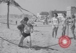 Image of Relna Brewster wrestles male opponent Venice Beach Los Angeles California USA, 1938, second 43 stock footage video 65675028765