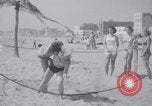 Image of Relna Brewster wrestles male opponent Venice Beach Los Angeles California USA, 1938, second 44 stock footage video 65675028765