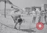 Image of Relna Brewster wrestles male opponent Venice Beach Los Angeles California USA, 1938, second 45 stock footage video 65675028765