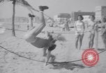 Image of Relna Brewster wrestles male opponent Venice Beach Los Angeles California USA, 1938, second 46 stock footage video 65675028765