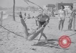 Image of Relna Brewster wrestles male opponent Venice Beach Los Angeles California USA, 1938, second 47 stock footage video 65675028765
