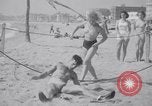 Image of Relna Brewster wrestles male opponent Venice Beach Los Angeles California USA, 1938, second 48 stock footage video 65675028765