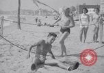 Image of Relna Brewster wrestles male opponent Venice Beach Los Angeles California USA, 1938, second 49 stock footage video 65675028765