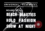 Image of models at Night fashion show Miami Florida USA, 1938, second 4 stock footage video 65675028767
