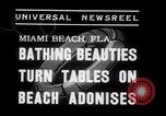 Image of Beach patrol officials and swimsuit models Miami Beach Florida USA, 1938, second 6 stock footage video 65675028768