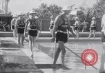 Image of Beach patrol officials and swimsuit models Miami Beach Florida USA, 1938, second 13 stock footage video 65675028768