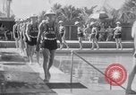 Image of Beach patrol officials and swimsuit models Miami Beach Florida USA, 1938, second 14 stock footage video 65675028768