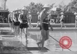 Image of Beach patrol officials and swimsuit models Miami Beach Florida USA, 1938, second 15 stock footage video 65675028768