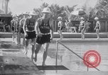 Image of Beach patrol officials and swimsuit models Miami Beach Florida USA, 1938, second 16 stock footage video 65675028768