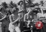 Image of Beach patrol officials and swimsuit models Miami Beach Florida USA, 1938, second 18 stock footage video 65675028768
