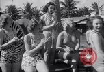 Image of Beach patrol officials and swimsuit models Miami Beach Florida USA, 1938, second 19 stock footage video 65675028768