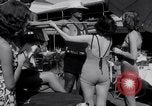 Image of Beach patrol officials and swimsuit models Miami Beach Florida USA, 1938, second 20 stock footage video 65675028768