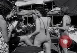 Image of Beach patrol officials and swimsuit models Miami Beach Florida USA, 1938, second 21 stock footage video 65675028768