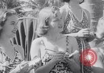 Image of Beach patrol officials and swimsuit models Miami Beach Florida USA, 1938, second 24 stock footage video 65675028768