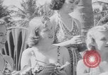 Image of Beach patrol officials and swimsuit models Miami Beach Florida USA, 1938, second 25 stock footage video 65675028768