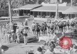 Image of Beach patrol officials and swimsuit models Miami Beach Florida USA, 1938, second 27 stock footage video 65675028768