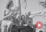 Image of Beach patrol officials and swimsuit models Miami Beach Florida USA, 1938, second 28 stock footage video 65675028768