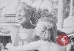 Image of Beach patrol officials and swimsuit models Miami Beach Florida USA, 1938, second 30 stock footage video 65675028768