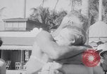 Image of Beach patrol officials and swimsuit models Miami Beach Florida USA, 1938, second 31 stock footage video 65675028768
