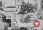 Image of Beach patrol officials and swimsuit models Miami Beach Florida USA, 1938, second 33 stock footage video 65675028768