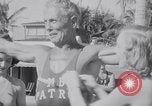 Image of Beach patrol officials and swimsuit models Miami Beach Florida USA, 1938, second 34 stock footage video 65675028768