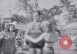 Image of Beach patrol officials and swimsuit models Miami Beach Florida USA, 1938, second 37 stock footage video 65675028768